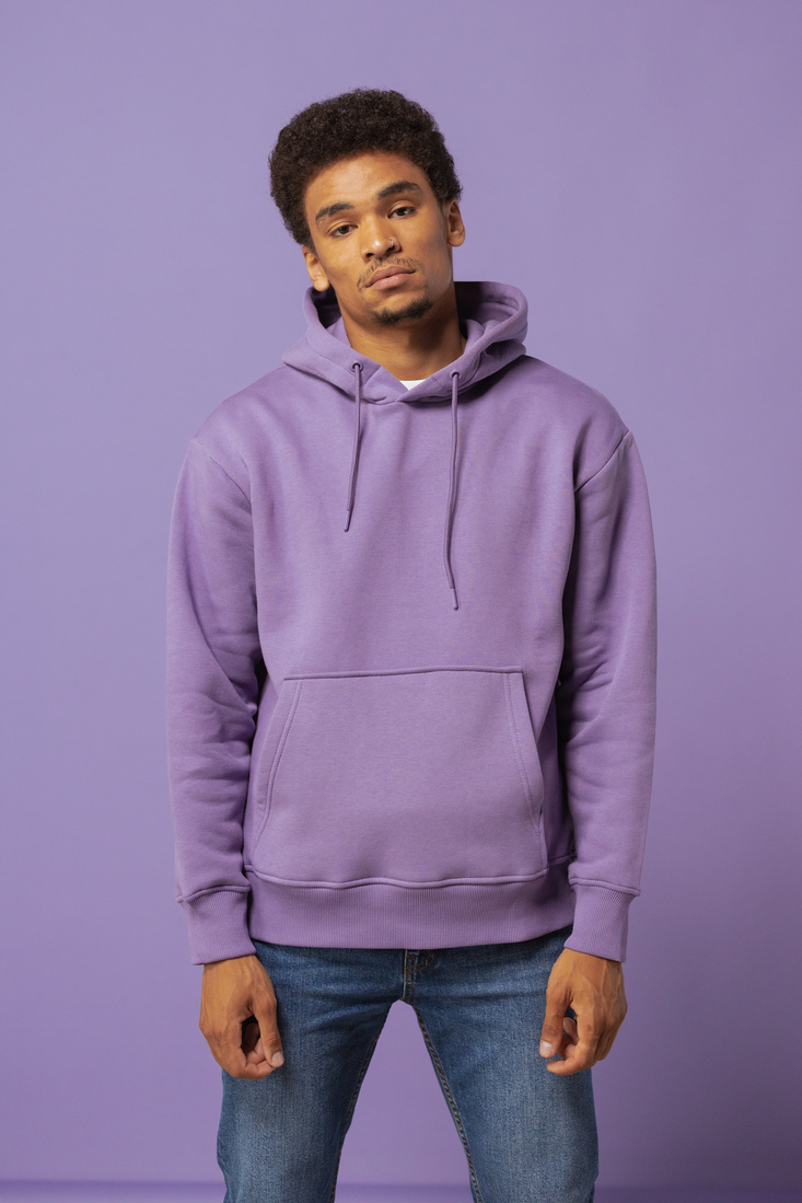 A Man Wearing a Purple Hoodie